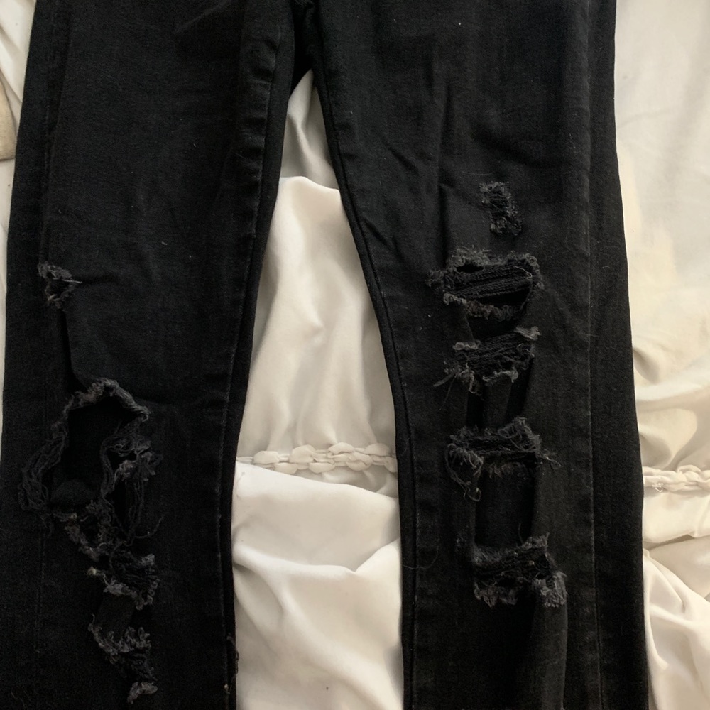 Black Zara ripped jeans from Paris